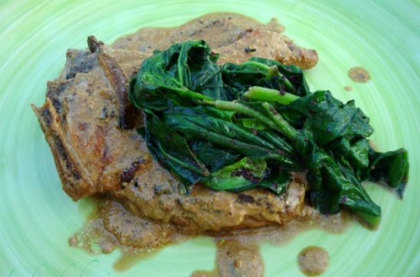Pork chops with cider and spinach